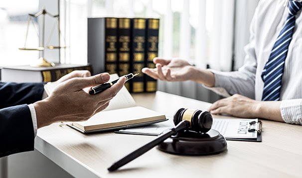 attorney talking to his client